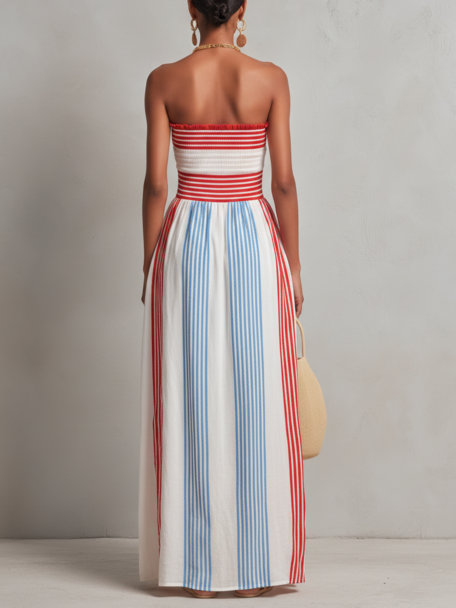 Estrella · Vestido maxi sin tirantes a rayas rojas y azules con fruncido