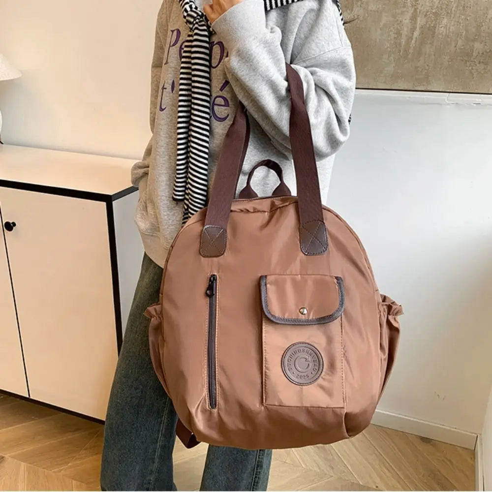 Elena | Mochila redonda de nailon