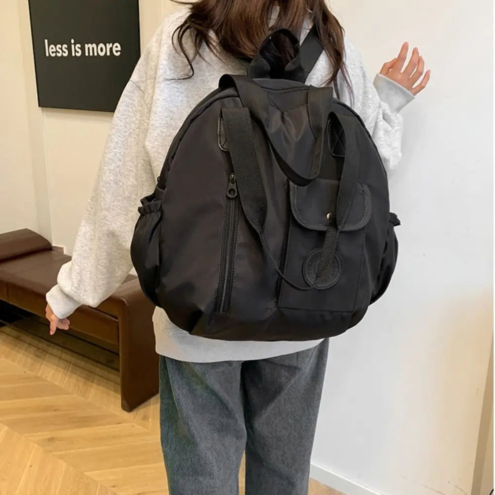 Elena | Mochila redonda de nailon