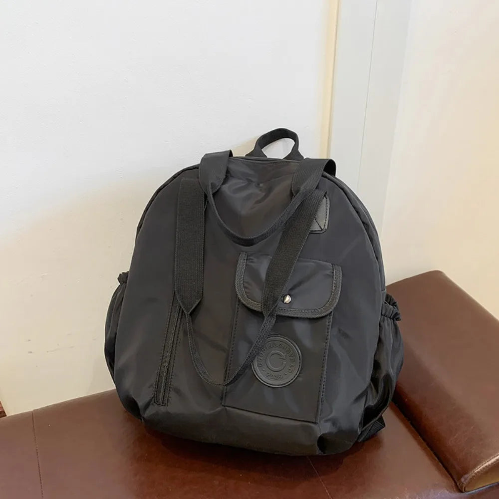 Elena | Mochila redonda de nailon