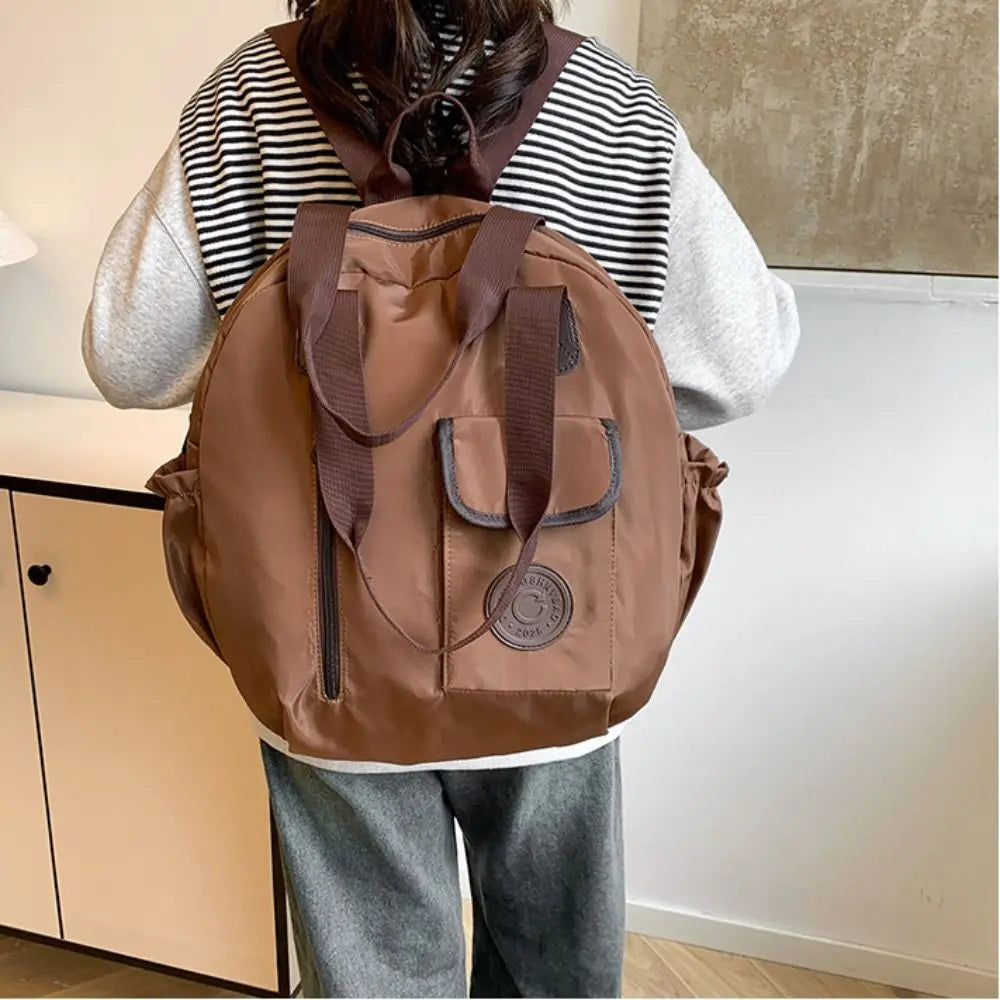 Elena | Mochila redonda de nailon
