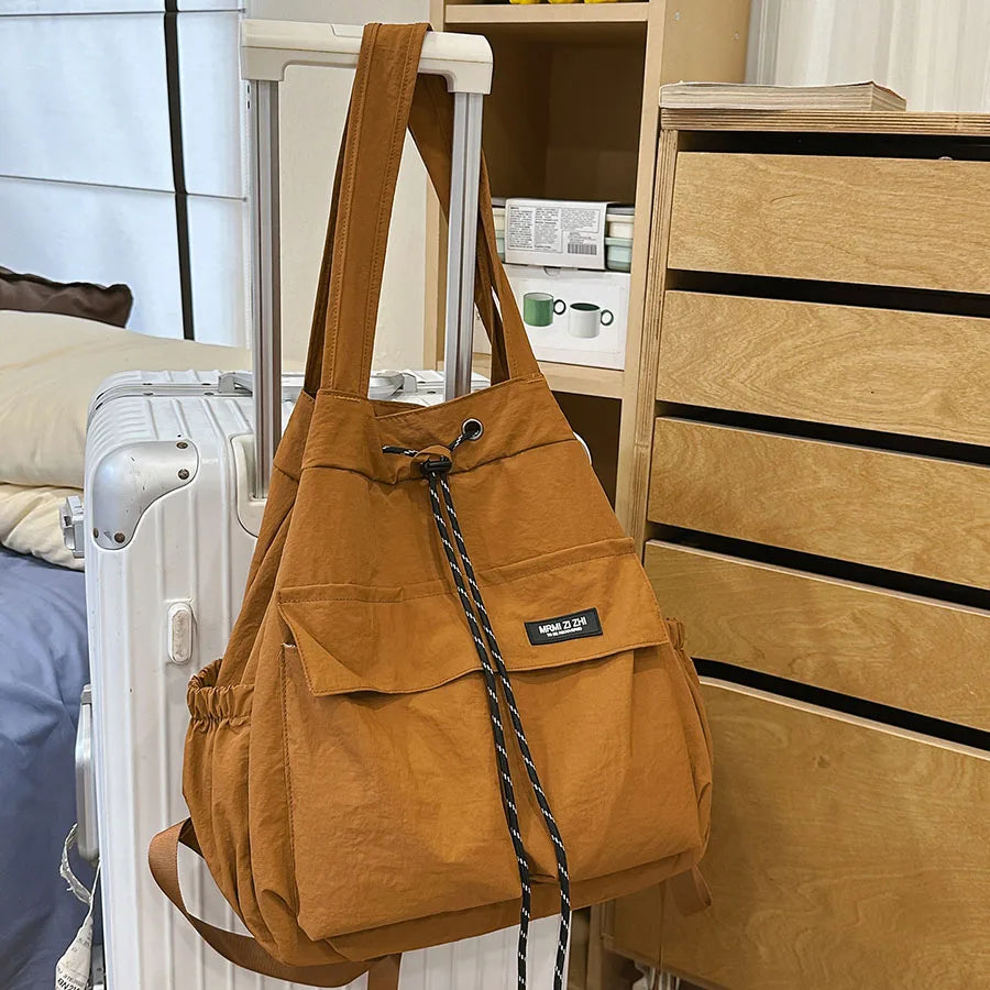 Camila | Mochila convertible con cordón