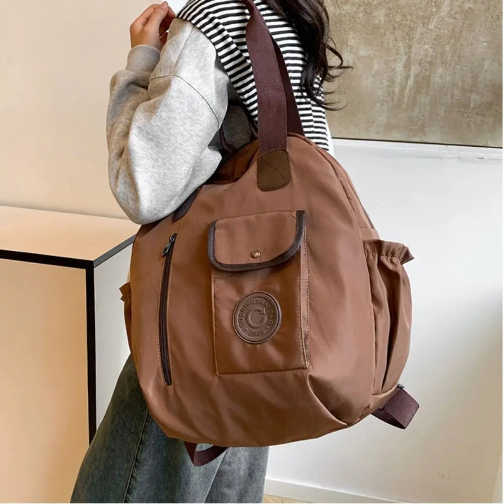 Elena | Mochila redonda de nailon